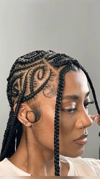 Cornrows artistiques avec box braids
